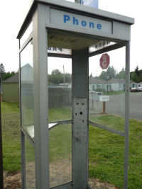 Empty pay phone booth