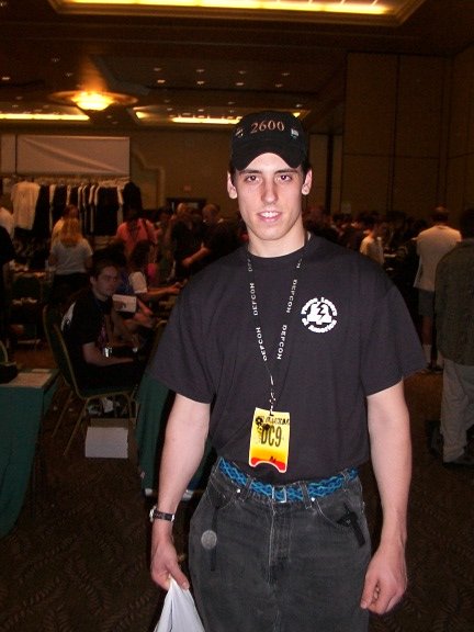 Some guy at Defcon 9 wearing our shirt.